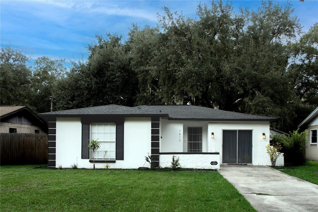 Photo of 7413 Lakeshore Drive, Tampa, FL 33604 (MLS # G5117951)