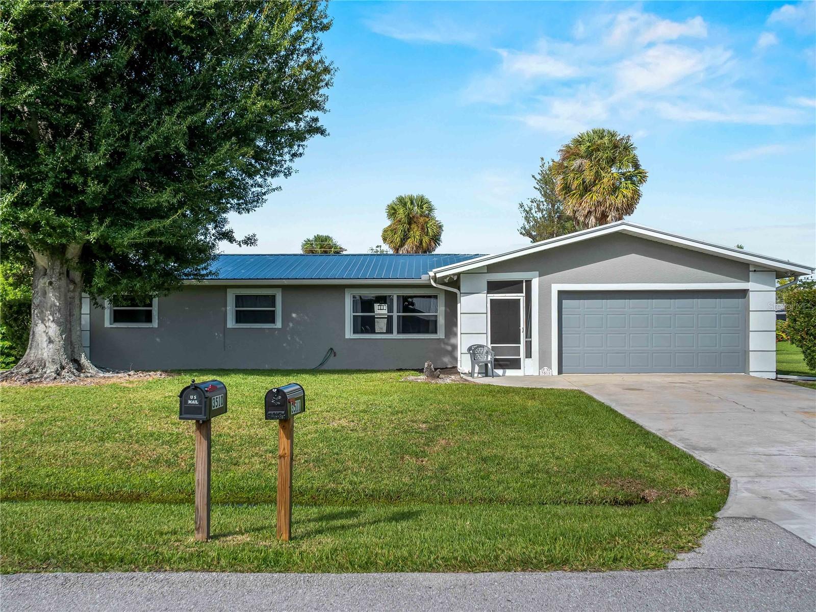 Welcome to 3511 Amanda Street – a beautifully upgraded Punta Gorda home that blends comfort, functionality, and style in a peaceful neighborhood setting. From the moment you step inside, you’ll notice the fresh, modern updates that make this property move-in ready. The open-concept kitchen is outfitted with sleek granite countertops, brand new KitchenAid appliances under extended warranties, and stylish cabinetry, making meal prep and entertaining a breeze. Warm-toned new flooring flows seamlessly throughout, accented by crisp crown molding that adds a touch of elegance to every room. Both bathrooms feature updated tiled showers and new Moen fixtures, giving them a clean, contemporary feel. The home also features recently replaced plumbing, providing peace of mind and long-term reliability. The spacious living area is filled with natural light, and the upgraded 3-ton, 14 SEER AC system (installed in 2025) ensures energy-efficient comfort year-round. Outside, enjoy your morning coffee or evening BBQs in the screened lanai overlooking a large backyard with a 12x12 shed—perfect for extra storage, hobbies, or a workshop. The attached garage has a new door and a tidy laundry setup, while the expanded driveway offers plenty of parking space. Located just minutes from downtown Punta Gorda, this home places you near shopping, dining, healthcare, top-rated schools, and serene waterfront parks. Plus, you're only a short drive away from the exciting new Sunseeker Resort. Don't miss your chance to experience this thoughtfully upgraded home—schedule your private showing today!