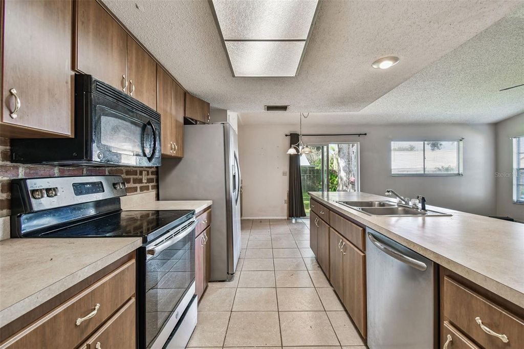 Photo of 2102 Grove Valley Avenue, Palm Harbor, FL 34683 (MLS # TB8441405)