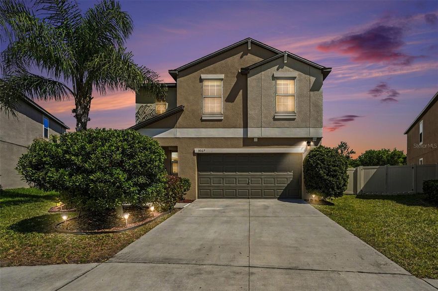 Click the Virtual Tour link to view the 3D walkthrough. ASSUMABLE 3.375% LOAN! Welcome to one of the LARGEST homesites in Sereno, offering an impressive .33-acre fully fenced yard where privacy and Florida living truly shine. Located in this sought-after gated, resort-style community in Wimauma, this beautifully maintained 4-bedroom, 2.5-bath home delivers space, comfort, and flexibility both inside and out. The open-concept layout is designed for easy living and entertaining, featuring a spacious great room, dining area, and an upgraded kitchen with modern cabinetry, ample counter space, a large single-basin sink, and all appliances included. Sliding glass doors lead to an extended covered patio with pavers, creating a seamless indoor-outdoor experience perfect for relaxing or hosting. The expansive backyard is a rare find, offering endless possibilities—add a pool, design your dream garden, or take advantage of the space for RV or boat parking. Upstairs, the private primary suite features a walk-in closet, dual vanities, and an en-suite bath, while three additional bedrooms and a full bath provide room for family, guests, or a home office. A large laundry room and convenient half bath downstairs add to the home’s functionality. Enjoy all that Sereno has to offer, including gated entry, a resort-style pool, dog parks, walking trails, and high-speed internet included in the HOA. With easy access to I-75, shopping, dining, and top-rated schools, this home combines peaceful living with everyday convenience. Don’t miss your chance to own a home with one of the largest lots in Sereno—schedule your showing today! Discounted rate options and no lender fee future refinancing may be available for qualified buyers of this home.