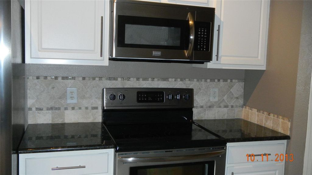 Photo of 583 Brantley Terrace Way #103, Altamonte Springs, FL 32714 (MLS # O6380836)