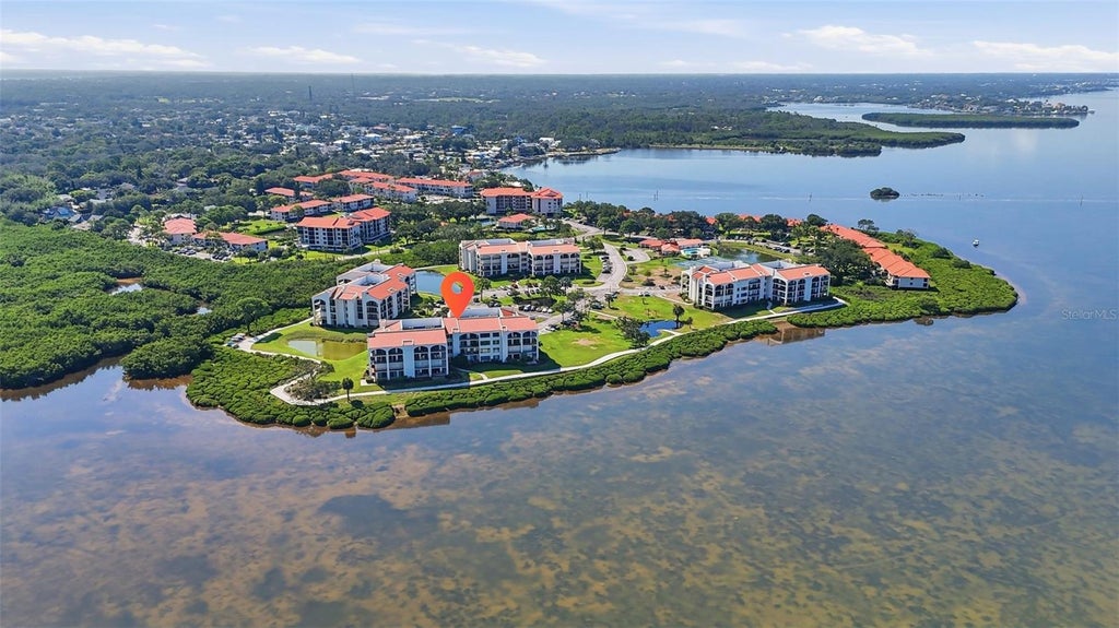 Photo of 301 Mariner Drive #301, Tarpon Springs, FL 34689 (MLS # TB8469783)
