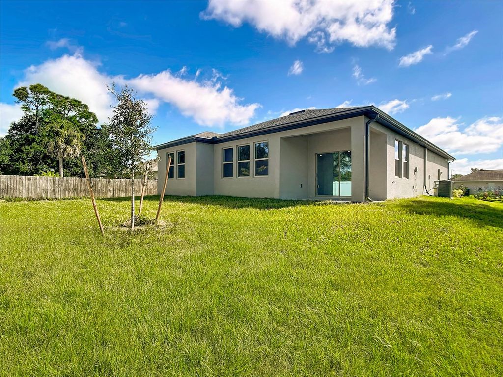 Photo of 1821 S San Mateo Drive, North Port, FL 34288 (MLS # TB8446056)