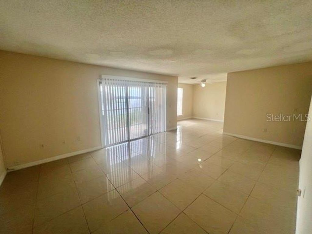 Photo of 4002 Versailles Drive #4002C, Orlando, FL 32808 (MLS # S5144826)