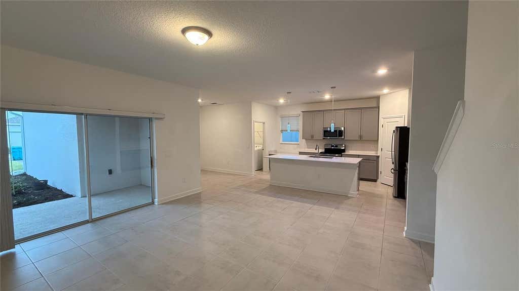 Photo of 11830 Language Way, Orlando, FL 32832 (MLS # O6429654)