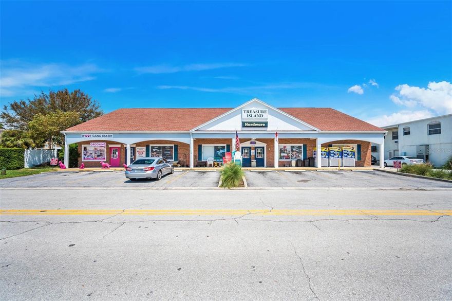 Highly unusual and unique income producing opportunity for the discriminating investor/user located in Treasure Island proper. Commercial multi-tenant building with two flourishing businesses (first floor) anchoring the operation and 10 second floor (on 1 year lease arrangements) office units accommodating the small business operator/entrepreneur. Building fully occupied! This structure has been the home of a "hardware store" operation for nearly 40 years.  The dog grooming shop next door co-anchors the site. Both are owner operated and both can continue to operate under a lease agreement (sale/lease back) to be successfully negotiated between buyer and seller during contract negotiations or seller can vacate per terms also to be negotiated. Well maintained improvement and in the hub of tourist/city activity in the surrounding area. Subject property is situated on a lot measuring 99x134 and affords more than adequate parking (front and rear) accommodating up to 29 automobiles. Much local redevelopment is in progress. Liberal C-2 Zoning permitting a huge variety of operations or continue on as an income producing property. Please drive-by only!!