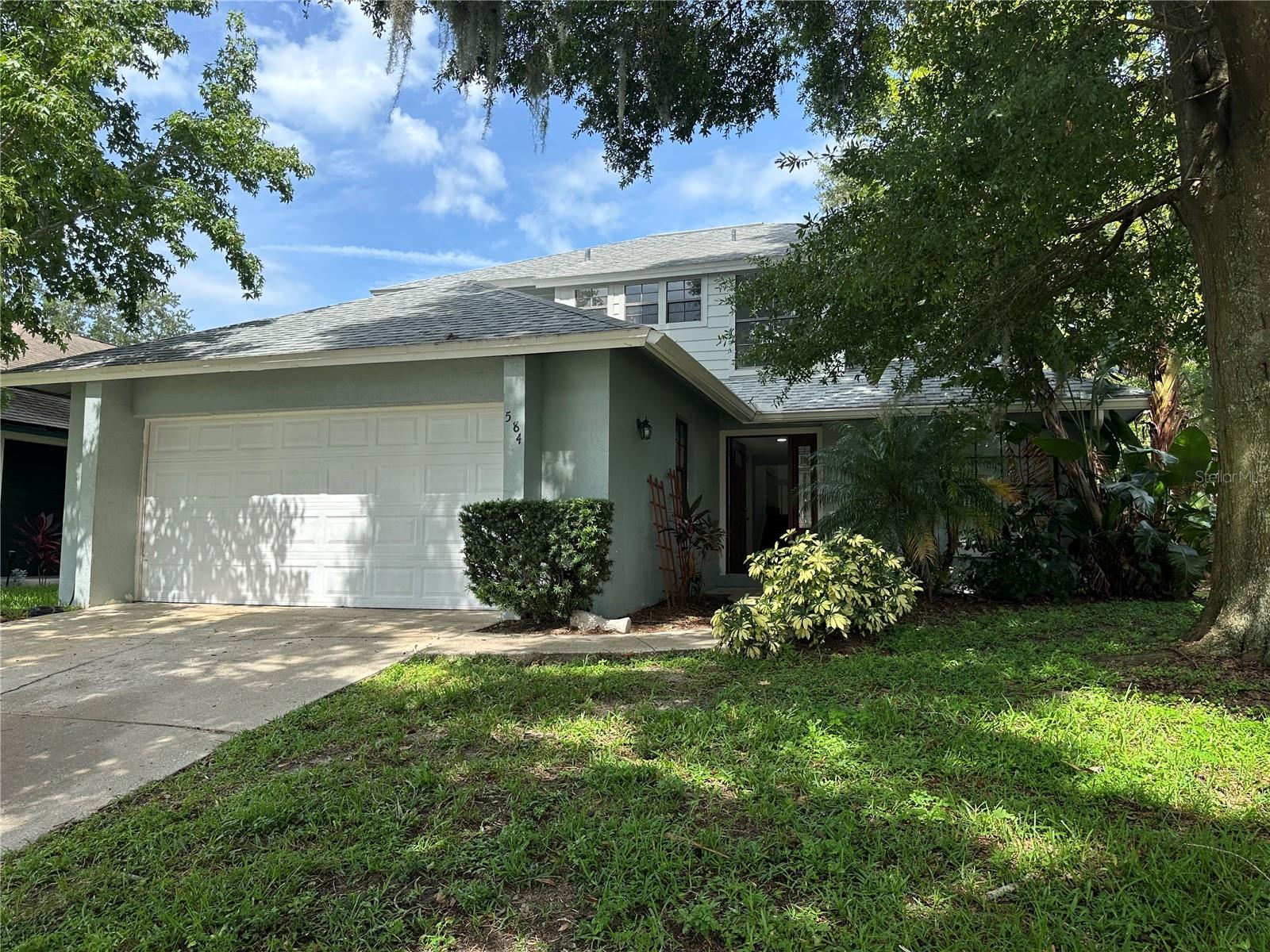 Lovely two-story home with tranquil view of Marshall Lake in this growing area of desirable Apopka. The home boasts two master bedrooms on second floor and a bonus room on the first floor that can be used as a 3rd bedroom/office/media room, etc. Granite counter-tops in kitchen and bathrooms; stainless steel s/s fridge. Tile and laminate wood flooring on first floor; carpeting and tile on second floor. Vaulted ceiling in Living Room with “Juliet window”. Open and airy with lots of light throughout the home. Freshly Painted. Mature Lemon Tree! Conveniently located near shops, restaurants and gas stations, and only a short distance from the Apopka Amphitheater & adjoining Northwest Recreation Complex, as well as Kelly Park where you can enjoy the free-flowing natural spring that maintains a cool 68 degrees year round. Easy access to the 451. Come to look, stay to live! Public Records Shows as 3/2