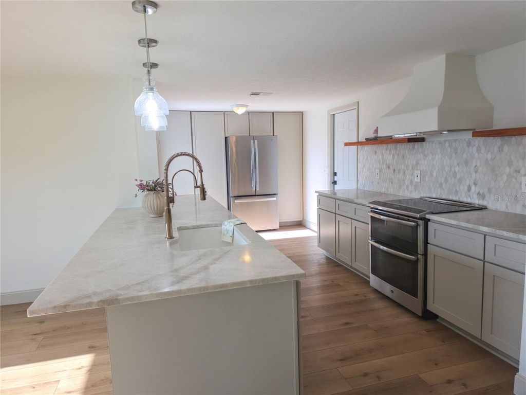 Photo of 505 Red Mangrove Lane, Apollo Beach, FL 33572 (MLS # O6403299)