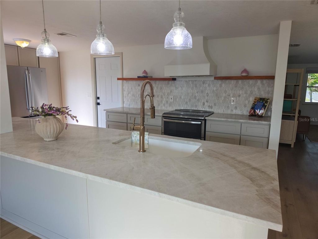 Photo of 505 Red Mangrove Lane, Apollo Beach, FL 33572 (MLS # O6403299)