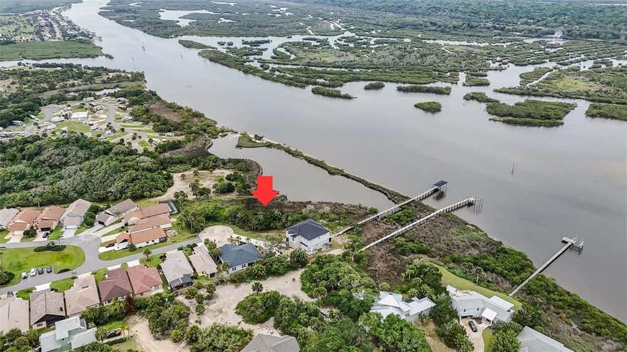 Nearly 100 feet of direct Intracoastal frontage with wide, open water views—just a few blocks from the beach. One of the last few intracoastal lots available beachside in Flagler Beach! This just-under half acre lot gives you the space to actually build what you want. Tucked on a quiet cul-de-sac next to 100+ acres of Gamble Rogers State Park, with no HOA, no build timeline, and underground utilities already in place, this lot is ready for you to build your dream home! This won't last long!