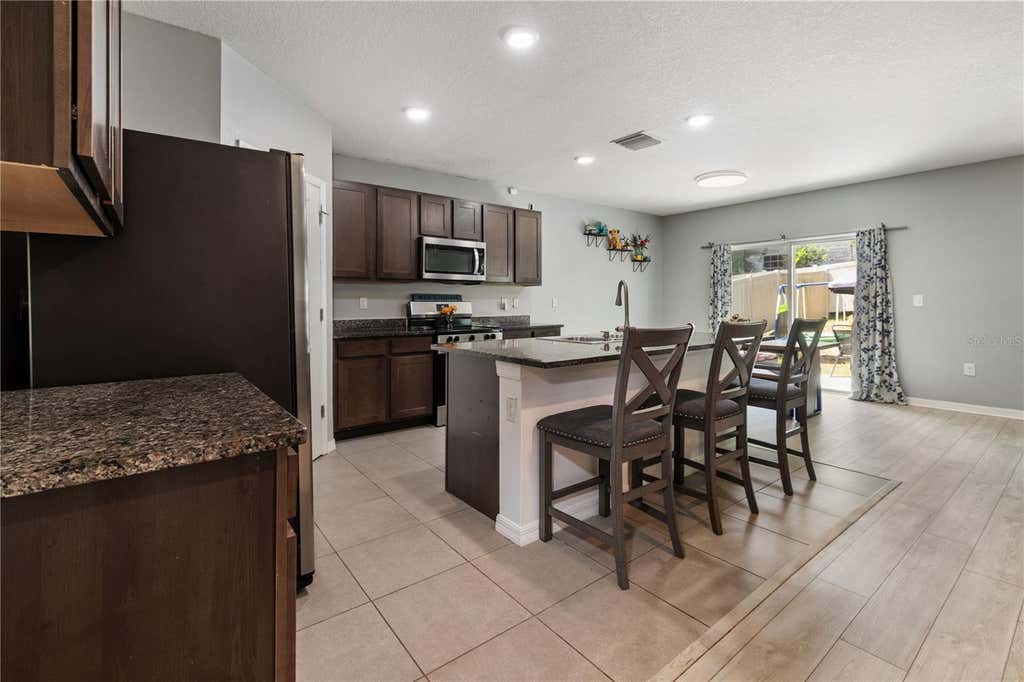 Photo of 9210 Watolla Drive, Thonotosassa, FL 33592 (MLS # TB8532865)
