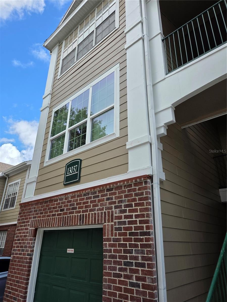 Photo of 13037 Mulberry Park Drive #523, Orlando, FL 32821 (MLS # O6443648)