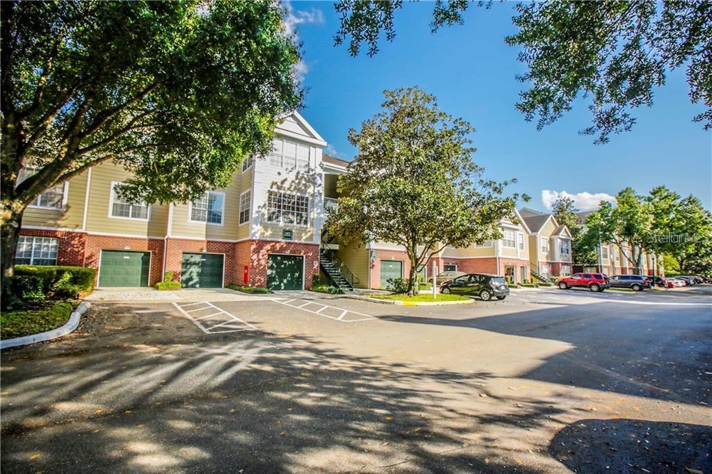 Photo of 13037 Mulberry Park Drive #523, Orlando, FL 32821 (MLS # O6443648)