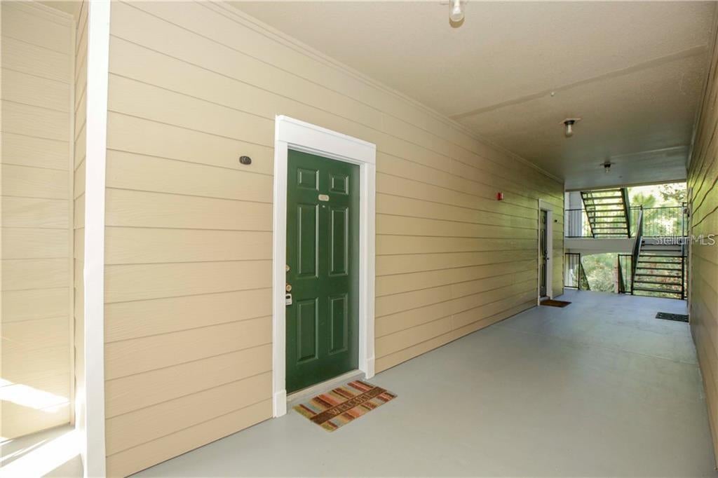 Photo of 13037 Mulberry Park Drive #523, Orlando, FL 32821 (MLS # O6443648)