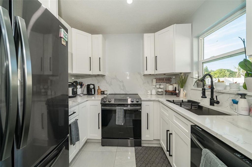 Photo of 710 E 114th Avenue, Tampa, FL 33612 (MLS # TB8453745)