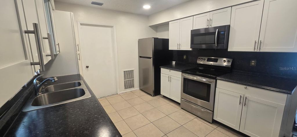 Photo of 23067 Elmira Boulevard, Punta Gorda, FL 33980 (MLS # TB8414097)