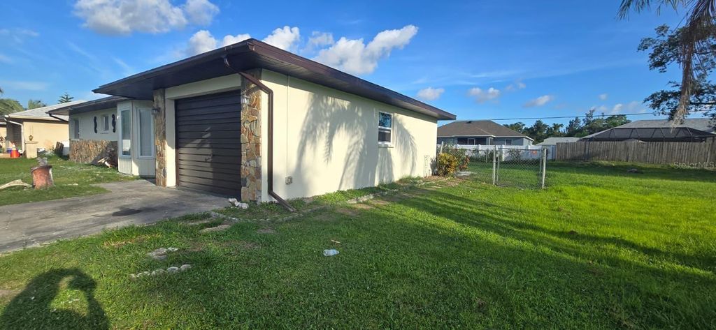 Photo of 23067 Elmira Boulevard, Punta Gorda, FL 33980 (MLS # TB8414097)