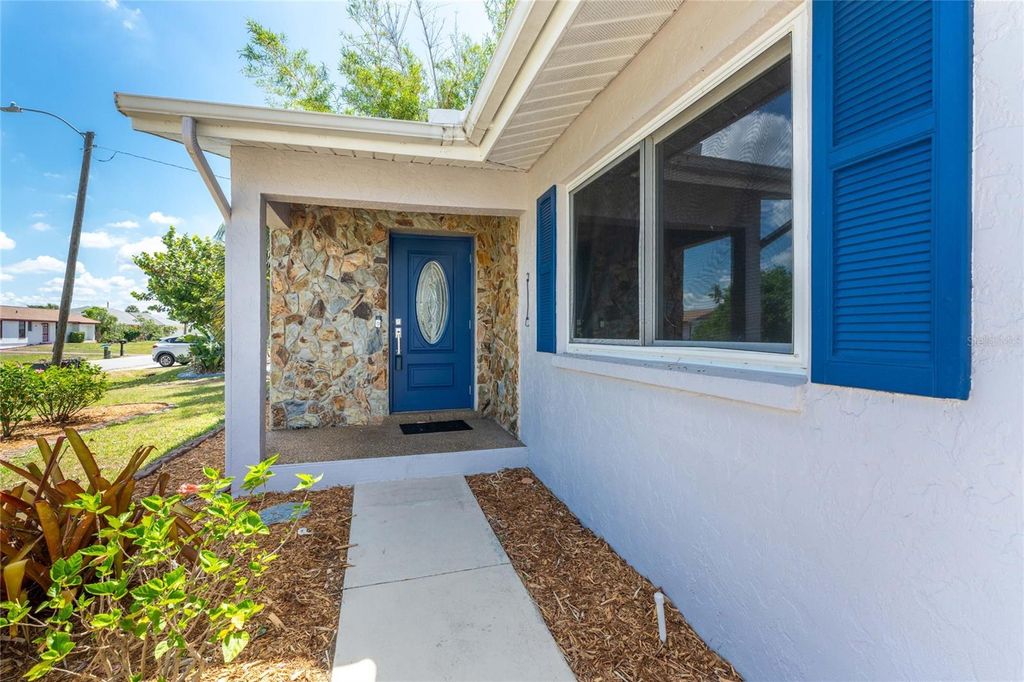 Photo of 557 Magnolia Avenue NW, Port Charlotte, FL 33952 (MLS # C7525498)