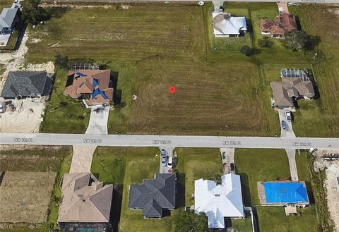 Photo of 1012 NW 7th Place, Cape Coral, FL 33993 (MLS # C7507883)