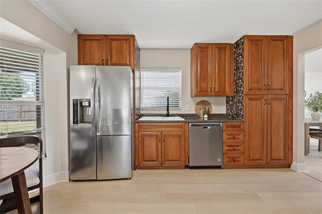 Photo of 1437 Mona Drive, Kissimmee, FL 34744 (MLS # O6435299)