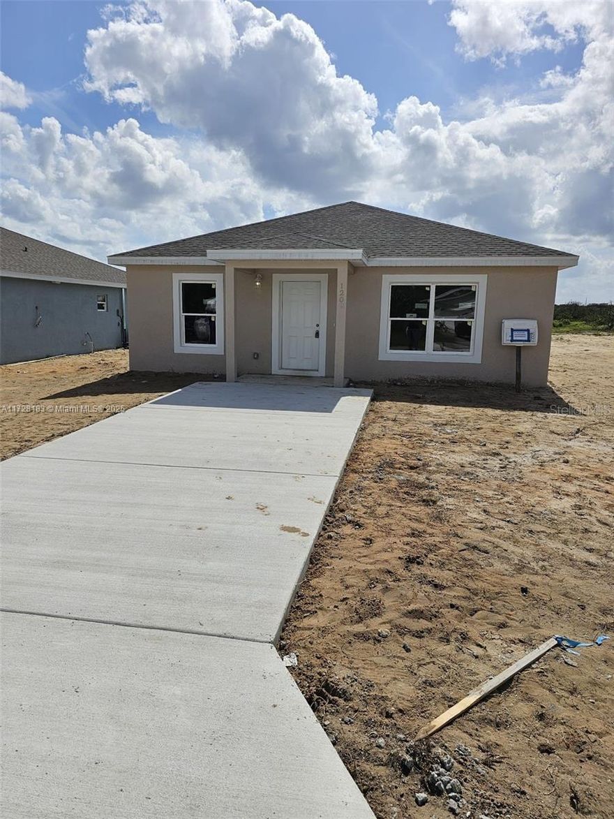 Under Construction. New Construction concrete block home ready to move in November 2025. 3 bedrooms, 2 bath includes 6 appliances. Washer, dryer, microwave, oven range, dishwasher, fridge/freezer. High quality vinyl flooring, high quality kitchen cupboards and quartz worktops. Ceiling fans and privacy blinds in every room. Lawn maintenance included. Space to park 2/3 cars. Storage space and plenty of space to make this house your home. Sebring Florida is the home to the famous International Sebring Raceway. Close to amenities, schools, restaurants, hospitals, grocery stores, a choice of lakes for fishing and water sports. Florida sun.