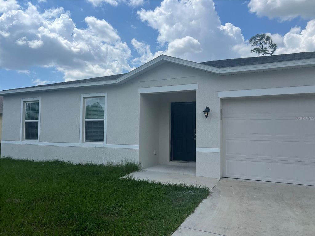 Photo of 1339 Maracaibo Street, Port Charlotte, FL 33980 (MLS # C7523901)