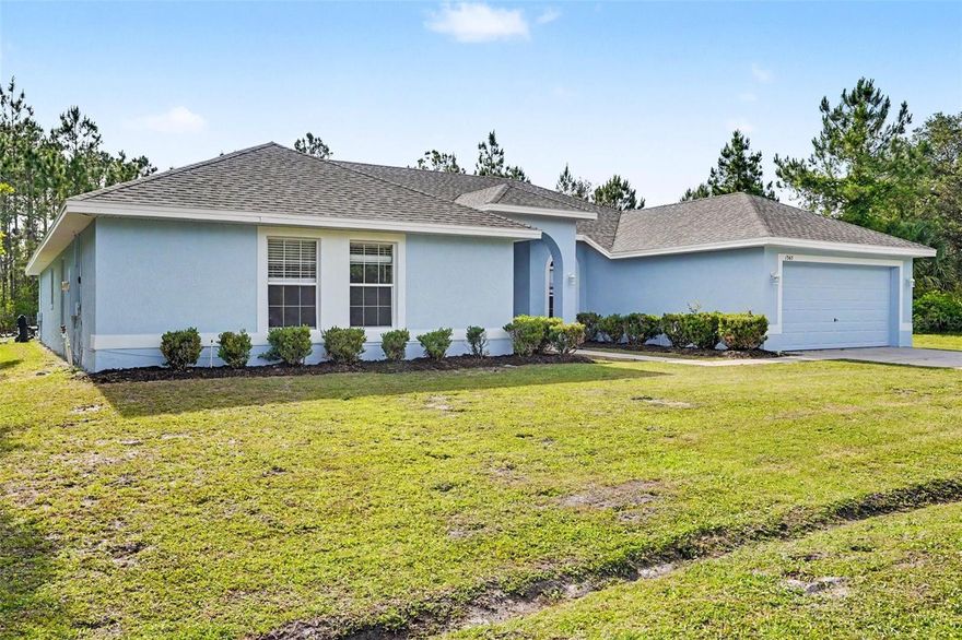 One or more photo(s) has been virtually staged. Welcome to this charming, and hard to find, single-story home in the highly desirable community of Poinciana Village, close to shopping and dining! This home features great curb appeal, with a welcoming front porch and spacious corner lot. The large rear patio and sparkling pool make this home perfect for outdoor enjoyment. Inside, you'll find a move-in ready and highly upgraded gem.  The open family room creates a bright and inviting atmosphere for everyday living and entertaining. The kitchen showcases white cabinetry, a functional island, and plenty of workspace for cooking and gathering. This home also includes a separate laundry room for added convenience and a two-car garage for ample parking and storage. Luxury vinyl plank flooring and tile run throughout, offering durability and easy maintenance. Step outside to enjoy the backyard pool, complete with a safety fence for added peace of mind. This home combines comfort, functionality, and great outdoor living spaces—an opportunity you won’t want to miss.