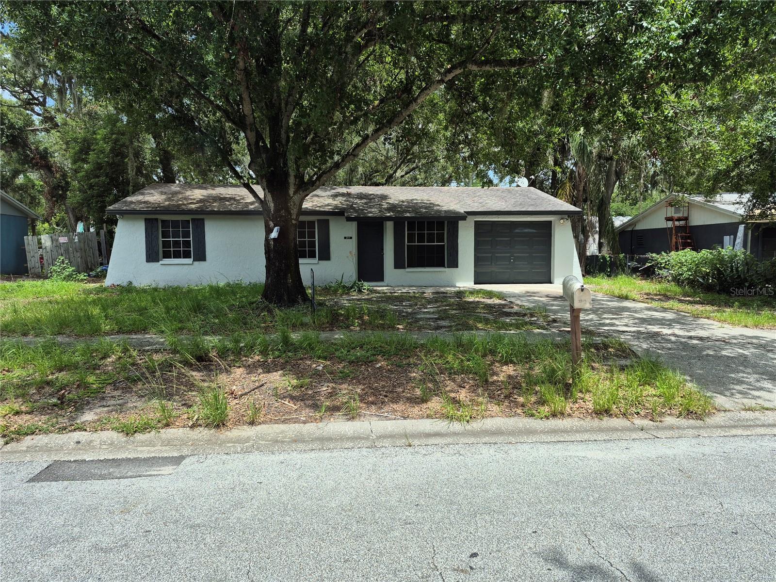 Concrete block home Features 3 bedrooms, 1 bathrooms, with a 1 Car. It has an open floor plan and a large fenced back yard. New Paint inside and out. Ice cold AC. New LVT flooring throughout.