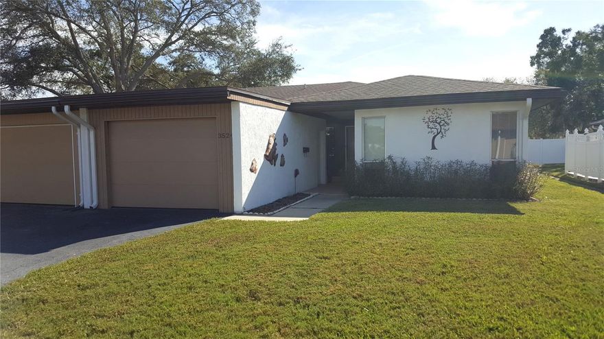 Nestled in a prime central location near Clark Rd & Beneva Rd, Village in the Pines N. is a small, quiet community, at the heart of Sarasota. Enjoy the convenience of being near great amenities, where shopping, dining, the new library and recreational activities are just around the corner. Siesta Beach is a short drive away and Sarasota Memorial Hospital and downtown are within easy reach. This over 55 complex offers a perfect balance of tranquility and accessibility. No pets (see docs for service animals).
This updated residence boasts a large living room, two spacious bedrooms and two bathrooms, plus a sunny den, providing ample space for both relaxation and functionality. The master bedroom offers a peaceful retreat with an ensuite bathroom & walk in closet, and the second bedroom is versatile enough to accommodate guests or serve as a home office. Just some of the upgrades include a new roof  2019, new garage door 2019. Recent upgrades include wood laminate flooring, hot water heater, granite countertops in kitchen, new sink, faucet, garbage disposal,  bathroom vanities, sinks, fixtures, mirrors & lights. Updated light fixtures & fans throughout. Nothing to do, but enjoy. The single garage not only provides secure parking but also adds an extra layer of convenience to your daily routine. Say goodbye to the hassles of street parking as you enjoy the ease of having your vehicle right at your doorstep. Join our community and savor the joys of stress-free living & chatting with your neighbors at the heated pool. Revel in the comfort of a home that reflects an easy lifestyle!