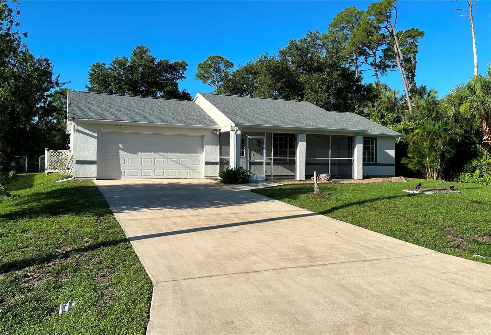 Click the Tour 1 icon above for the NARRATED VIDEO VIRTUAL TOUR, not just the same still photos! This well laid out home is tucked away on a very quiet street. Its only hallway is about 4’ long, so almost every square foot of this home is useable space. The brand-new kitchen (dishwasher not included) features wood cabinets and granite countertops – very modern and very stylish. The stainless-steel farm sink will please any homemaker. The kitchen, dining area and living room are brightened by quite a bit of natural light thanks to large windows and a sliding glass door. Cathedral and vaulted ceilings add spaciousness to the living areas. The most attractive features (after the pool) are the large, screened front porch and large covered lanai – shaded areas that allow for comfortable outdoor living, especially for seniors or children. The heating of the pool affords the owners the opportunity to use the pool year-round, a welcome upgrade. Shopping, movie theaters, and restaurants are just 2+/- miles away. This property comes with a ONE YEAR HOME WARRANTY for the buyer covering appliances, air conditioning, electric and plumbing systems, etc. MUCH MORE INFO is attached – ask your agent for copies, especially the FEATURES LIST and WARRANTY OUTLINE.