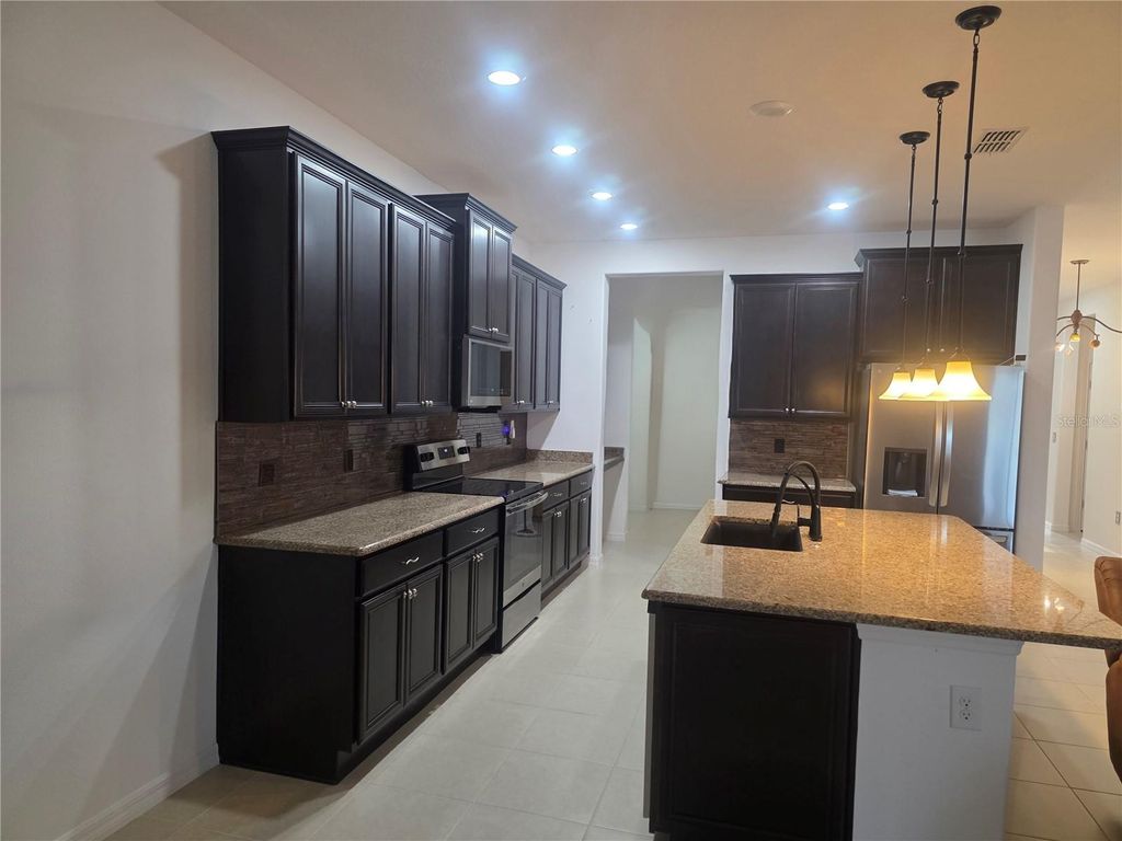 Photo of 356 Bella Cortina Drive, Poinciana, FL 34759 (MLS # S5140752)