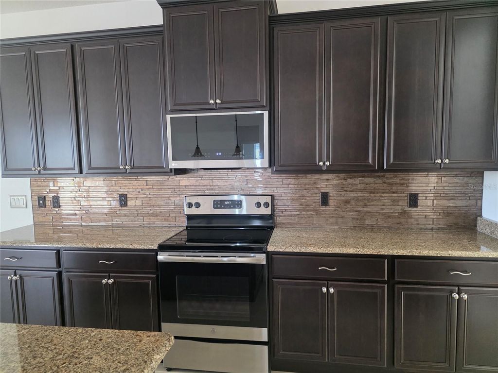 Photo of 356 Bella Cortina Drive, Poinciana, FL 34759 (MLS # S5140752)