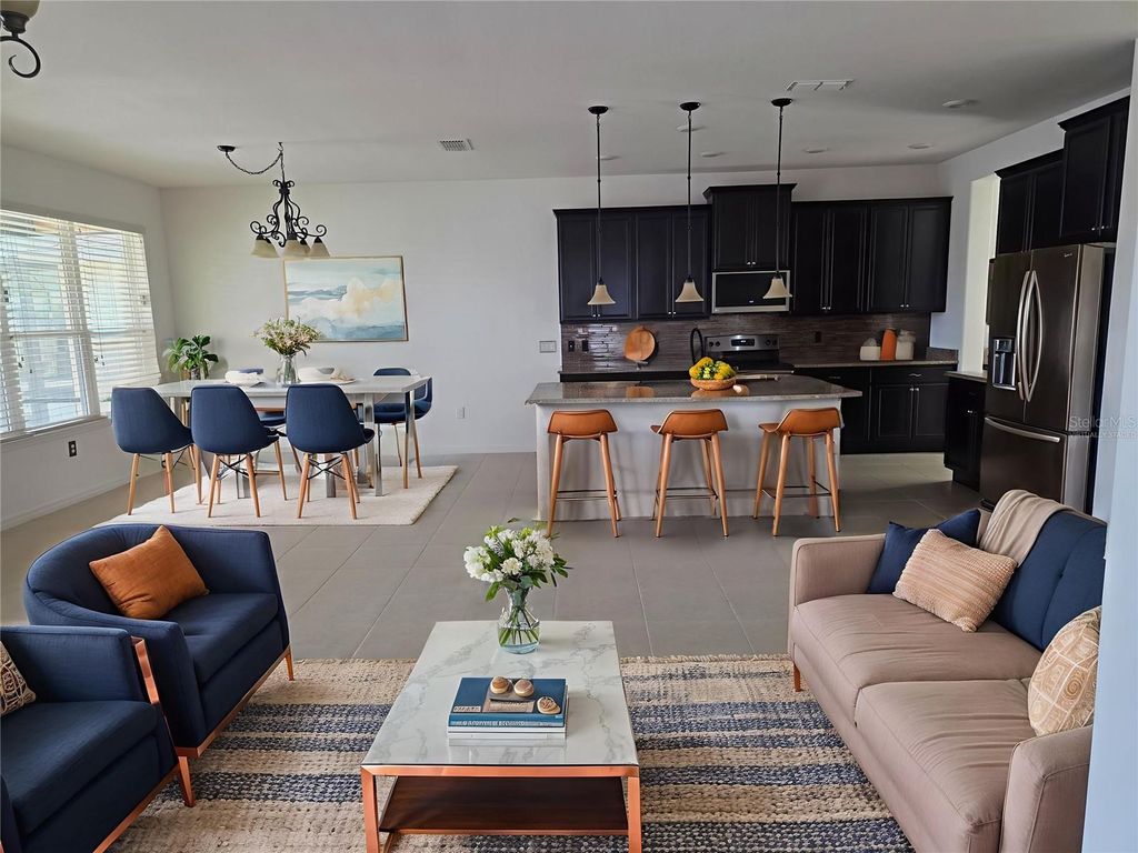 Photo of 356 Bella Cortina Drive, Poinciana, FL 34759 (MLS # S5140752)