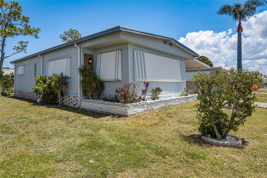 Welcome to Terra Ceia Manor, a quaint 55+ manufactured home community located in Palmetto, Florida. This location is convenient to both Bradenton and the St Pete area, just a few minutes drive from the Sunshine Skyway! This 2 bedroom / 2 bathroom home has a wonderful location in the community, right across from the clubhouse and all the amenities! Step in to the front door to an additional seating area. This will lead you into the main living space, with the living room, dining room, and kitchen. The rear of the home has the 2nd bedroom, and 2nd full bathroom. The master suite features an ensuite bathroom. In addition to the carport, there is a screen room for extra living space! Terra Ceia Manor has plenty of amenities, including a clubhouse, horseshoes, shuffleboard, and community pool. There is always something to do, and activities include bingo, euchre, bridge, coffee hours, game nights, poker, potluck dinners, and water aerobics. This is a 55+ cooperative community. Ready for IMMEDIATE closing!