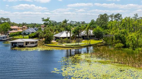 Photo of 10300 Pocket Lane, Orlando, FL 32836 (MLS # O6319089)