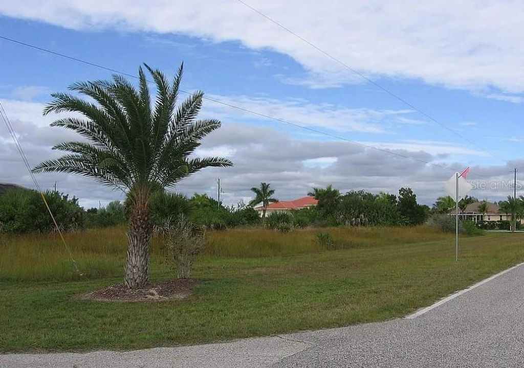 Photo of 15725 Meacham Circle, Port Charlotte, FL 33981 (MLS # TB8423583)