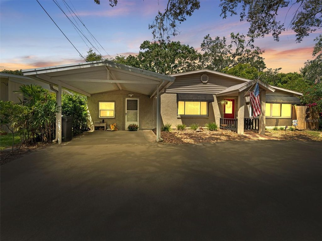 Photo of 12510 Noreast Lake Drive, Tampa, FL 33612 (MLS # TB8431629)