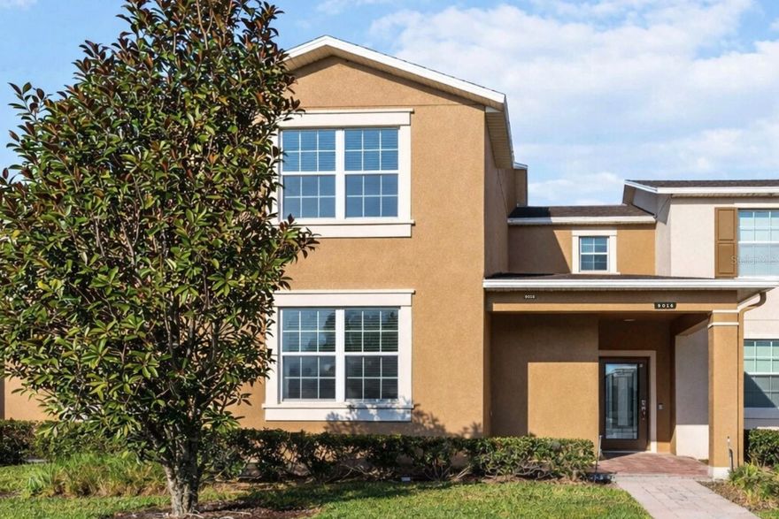 One or more photo(s) has been virtually staged. Welcome to easy, LOW-MAINTENANCE living in the charming SAVANNAH LANDINGS community, ideally located in one of ORLANDO’S fastest-growing corridors near LAKE NONA. This WATER VIEW TOWNHOME offers OVER 2,000 SQUARE FEET OF LIVING SPACE and features a highly desirable FIRST-FLOOR PRIMARY SUITE, combining generous interior space with everyday convenience.

The home offers an OPEN FLOOR PLAN with TILE FLOORING, BRUSHED NICKEL lighting, and a layout designed for comfortable living and entertaining. The kitchen features GRANITE COUNTERTOPS, ESPRESSO CABINETRY, and STAINLESS STEEL APPLIANCES, creating a stylish and functional space for daily living or hosting guests.

The FIRST-FLOOR PRIMARY SUITE includes a spacious bathroom with GRANITE COUNTERS, a GLASS-ENCLOSED SHOWER, PRIVATE WATER CLOSET, and WALK-IN CLOSETS designed to maximize storage.

Upstairs, a versatile LOFT / GAME ROOM provides additional living space ideal for a MEDIA ROOM, HOME OFFICE, or relaxation area. The second floor also features THREE ADDITIONAL BEDROOMS, each with WALK-IN CLOSETS.

Additional storage upgrades include LAUNDRY ROOM SHELVING, GARAGE STORAGE RACKS, BIKE MOUNTING SYSTEMS, and ATTIC STORAGE.

Enjoy incredible convenience with a COFFEE SHOP, RESTAURANTS, and MEDICAL FACILITIES located just across the street, plus easy access to LAKE NONA TOWN CENTER, LAKE NONA MEDICAL CITY, and the CENTRAL FLORIDA GREENEWAY (SR-417), providing quick travel to ORLANDO INTERNATIONAL AIRPORT and DOWNTOWN ORLANDO.

Outdoor lovers will appreciate being just minutes from MOSS PARK, known for BOATING, FISHING, CAMPING, and scenic LAKEFRONT TRAILS.

This home offers the perfect combination of SPACE, LOCATION, and LOW-MAINTENANCE LIVING in one of CENTRAL FLORIDA’S most desirable and rapidly growing areas. Schedule your private showing today and discover the comfort, convenience, and lifestyle that Savannah Landings has to offer.