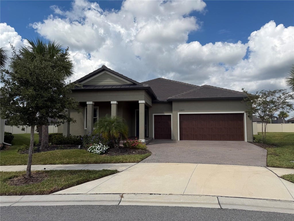 Photo of 31875 Magna Gulf Loop, San Antonio, FL 33576 (MLS # TB8488358)