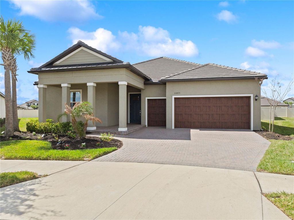 Photo of 31875 Magna Gulf Loop, San Antonio, FL 33576 (MLS # TB8488358)