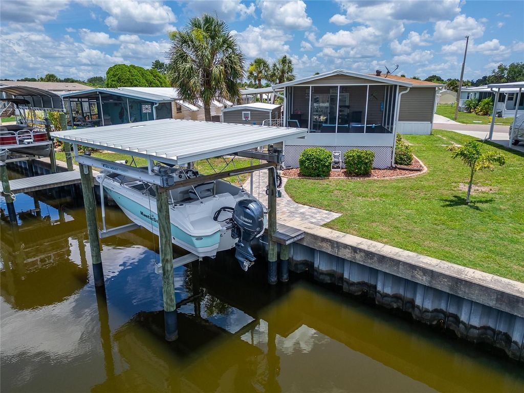 Photo of 108 W Saint Annes Circle, Apollo Beach, FL 33572 (MLS # TB8396680)