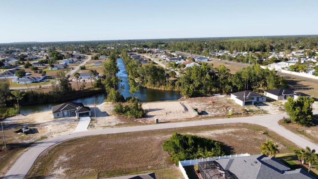 Photo of 3816 NE 23rd Avenue, Cape Coral, FL 33909 (MLS # TB8352512)