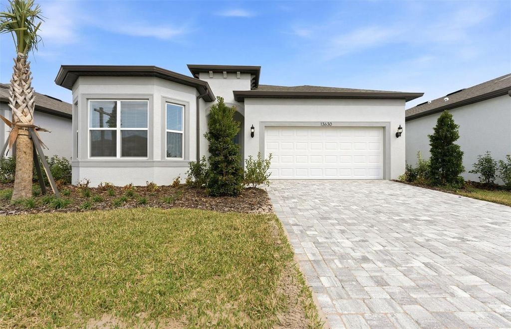 Photo of 13630 Canyon Ridge Road, Spring Hill, FL 34610 (MLS # TB8436455)