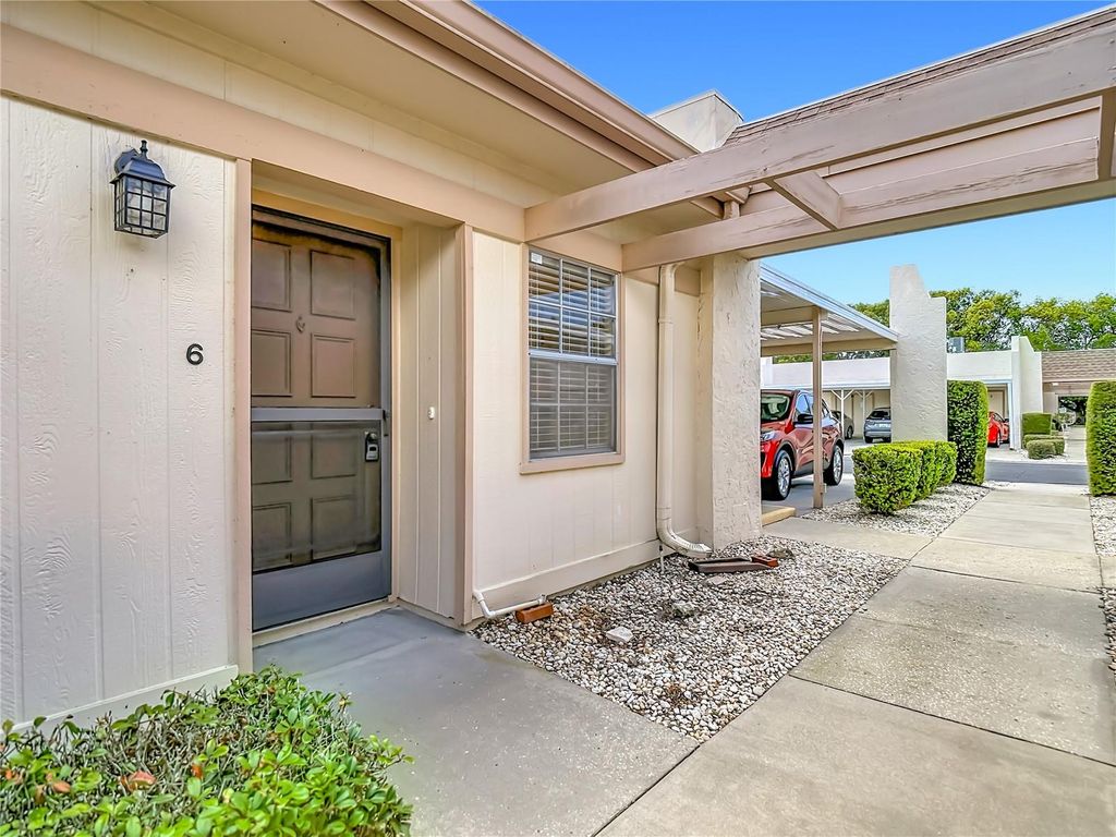 Photo of 11132 Pembridge Court #6, Port Richey, FL 34668 (MLS # W7885102)