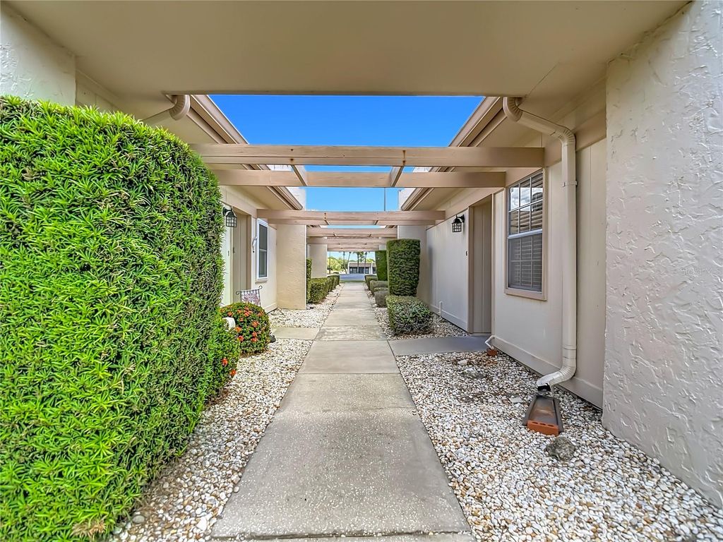 Photo of 11132 Pembridge Court #6, Port Richey, FL 34668 (MLS # W7885102)