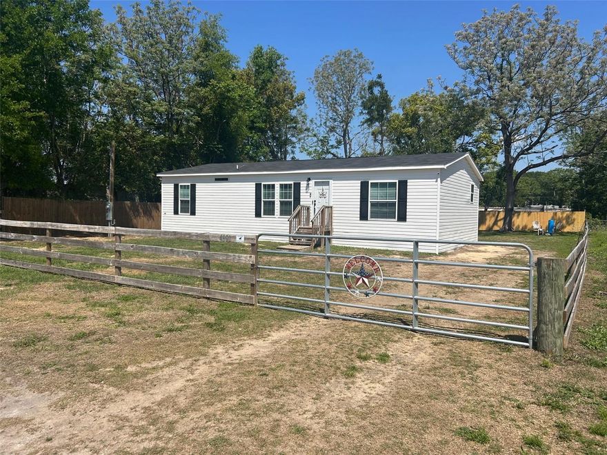 This is the one you’ve been waiting for! Brand new 2025 manufactured home with NO HOA, offering modern features and functional living throughout. The open floor plan showcases luxury vinyl flooring, high ceilings, and crown molding for a clean, elevated feel. The spacious kitchen features an island with bar seating, abundant cabinetry, a stainless farmhouse sink with drying rack and cutting board, and stainless steel appliances with a glass cooktop, all opening seamlessly to the living and dining areas. The dining area includes sliding doors leading to the backyard, while the living room provides plenty of space for everyday living and entertaining. The primary suite is generously sized and offers a walk-in closet, double vanities, a large walk-in shower, and a relaxing soaking tub. Two additional bedrooms include built-in closets and ceiling fans, with a second bathroom featuring a tub/shower combination. Additional highlights include a 12x5 laundry room with direct access to the backyard. The property is fully fenced with a gated entry and features a 24x36 three-bay pole barn, perfect for storage, hobbies, or equipment.