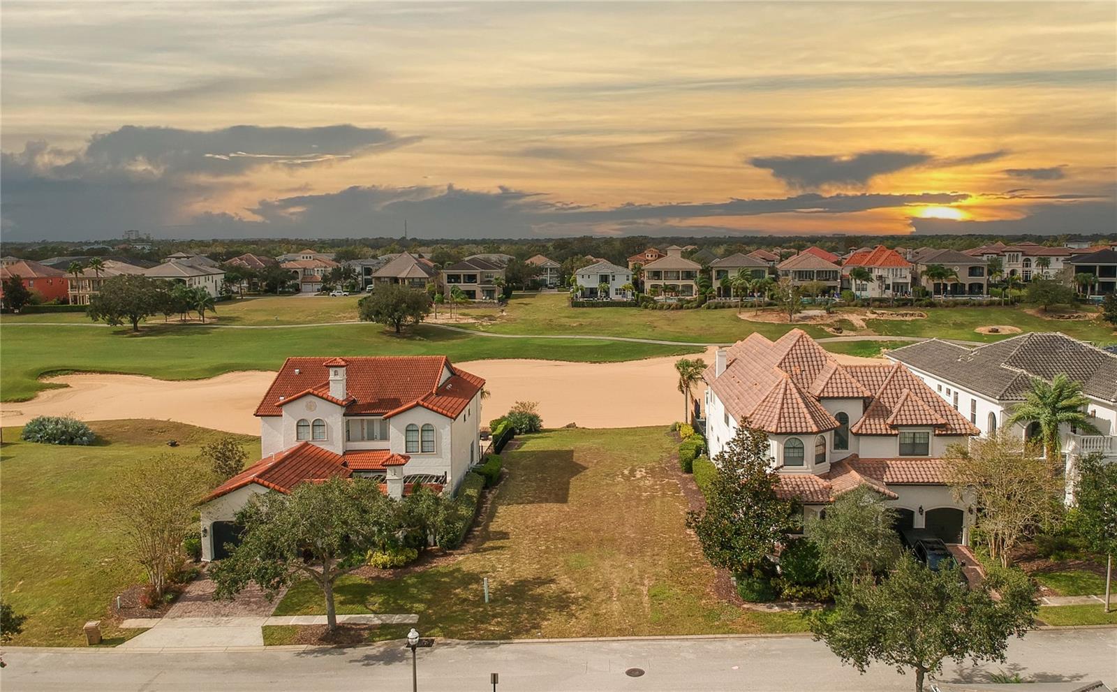Presenting one of the few remaining west-facing homesites on the renowned 14th hole of the Nicklaus course in Reunion’s prestigious Legends Corner. This exceptional lot offers breathtaking golf course views and is conveniently located within walking distance to the Nicklaus clubhouse.
Just a 10-minute drive from Disney, this property includes an active resort membership, enhancing the experience for rental guests with full access to a comprehensive suite of premier amenities. These include 13 community pools, three signature golf courses designed by Palmer, Watson, and Nicklaus, a world-class water park, diverse onsite dining options, two golf pro shops, six hydro-grid clay tennis courts, and a miniature golf course.
This exclusive membership truly elevates the guest experience, providing all the essentials for an unforgettable and enjoyable stay.