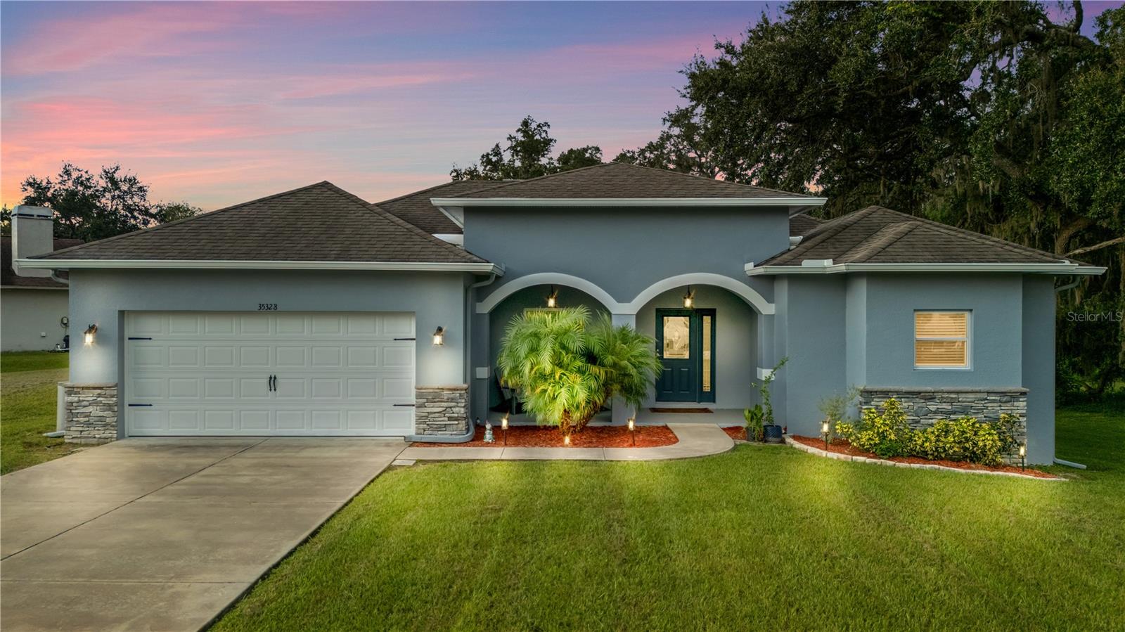 Welcome to 35328 Lake Edward Drive, a beautiful 3-bedroom, 2-bathroom home offering 1,760 sq. ft. of modern living space on an expansive 0.7-acre homesite. Built in 2019, this residence combines contemporary design with comfort, all nestled in the highly desirable community of Lake Bernadette Gardens. Enjoy the benefits of a non-CDD neighborhood with an extremely low HOA, giving you both peace of mind and affordability. Step outside and take in the spacious lot — plenty of room for outdoor entertaining, gardening, or even future additions, all in a no flood zone. Inside, the home features an open-concept layout designed for today’s lifestyle. The location is unbeatable — just minutes from shopping, dining, and everyday conveniences, and within walking distance to the local golf course for those who love to hit the greens. This is more than a home it’s the perfect balance of space, style, and community living in one of Zephyrhills’ most sought-after neighborhoods.