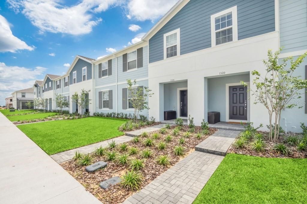 Photo of 1320 Lava Tree Dr, Davenport, FL 33897 (MLS # O6338426)