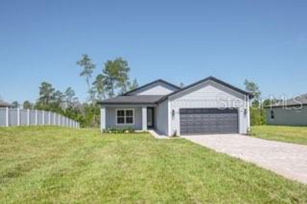 Photo of 604 Marion Oaks Lane, Ocala, FL 34473 (MLS # P4937743)